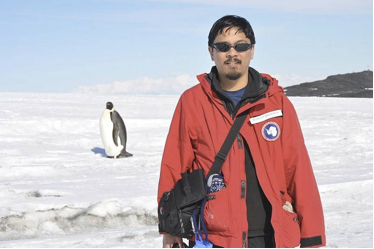 Scientist on the ice. IGERT trainee Dennis Evangelista investigating the ecomechanics of anchor ice.