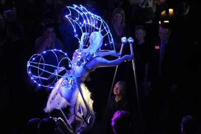 A member of the audience reacts to a hybrid physical digital figure from the Immerge show at the Emerge event.