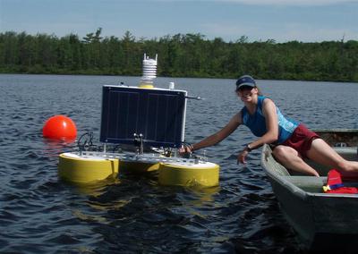 Jennie Brentrup deploying buoy