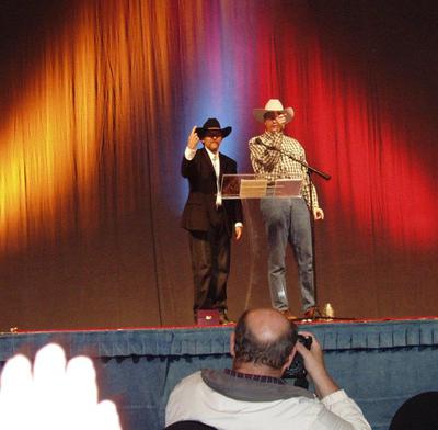 Richard Corsi and Glenn Morrison promote Indoor Air 2011 at the closing ceremony of the conference Healthy Buildings 2009 conference