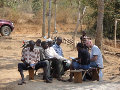 IGERT Associate Guy Grossman meeting with members of a farmer association in Uganda